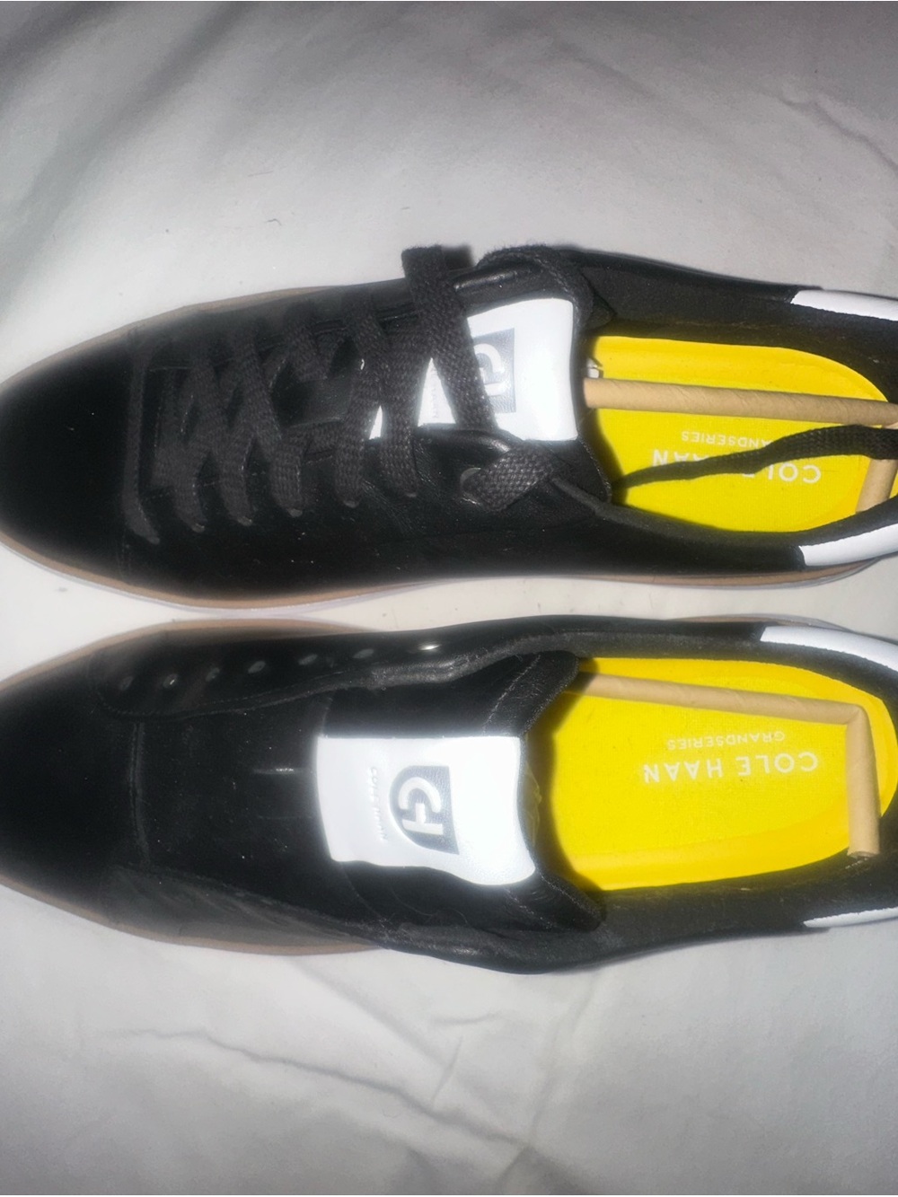 Cole Haan Black Leather Sneakers with Yellow Insole and White Logo Detail